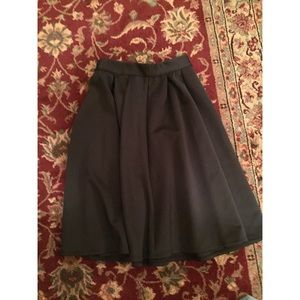 Black pleated midi scuba skirt